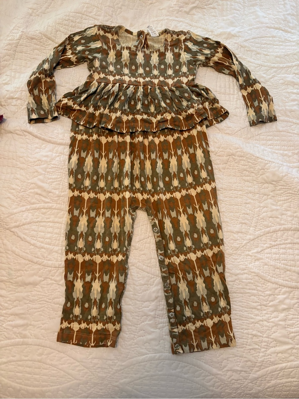 Kate Quinn Patterned Peplum Baby Romper in Olive & Rust